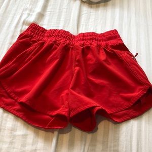 red Lululemon shorts